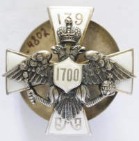 Нагрудный знак 139-го пехотного Моршанского полка. Утвержден в 1911 г. 1911-1916 гг. Серебро, эмаль цветная, штамповка, эмалирование. 39x40 мм. Изготовлен в г. Москва.