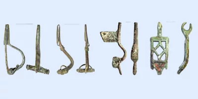 Слева направо: фибулы центральноевропейского происхождения (1-3) и фрагмент звена цепи круга восточноевропейских выемчатых эмалей с памятников середины III века поречья Упы