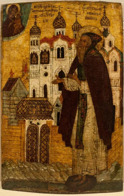 Преподобный Антоний Римлянин, с видом монастыря. Икона. Великий Новгород, XVI в. (?). Дерево, левкас, темпера, 60х43х7 см (спил). ГИМ