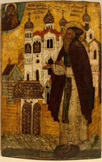 Преподобный Антоний Римлянин, с видом монастыря. Икона. Великий Новгород, XVI в. (?). Дерево, левкас, темпера, 60х43х7 см (спил). ГИМ