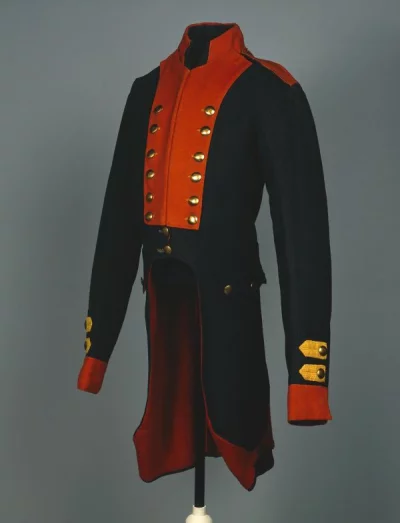 Мундир солдатский Павловского гренадерского полка вр. Павла I (прин. князю Долгорукову), сукно темнозеленое, приклад-оранжевое, петлицы на рукавах желтые, пуговицы золоченые. 1796-1801 гг. Сукно, длина: 93 см; 77 см. ГЭ